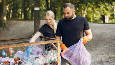 Couple busy in waste collection